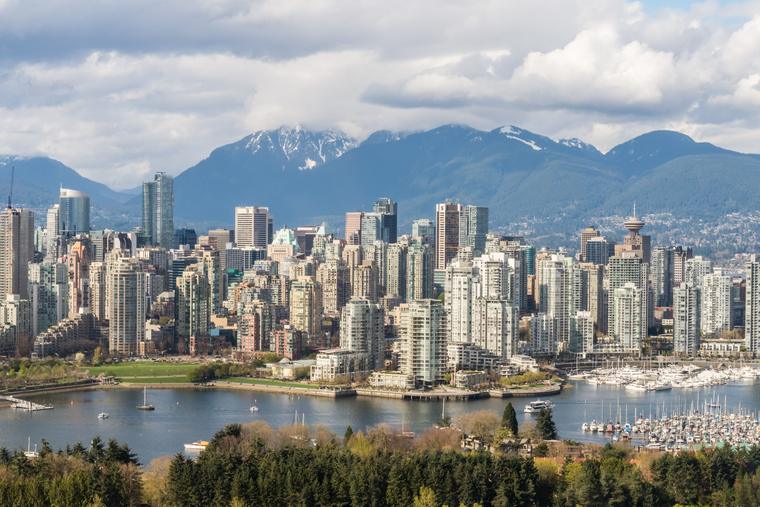 Downtown Vancouver skyline with the North Shore mountains behind it