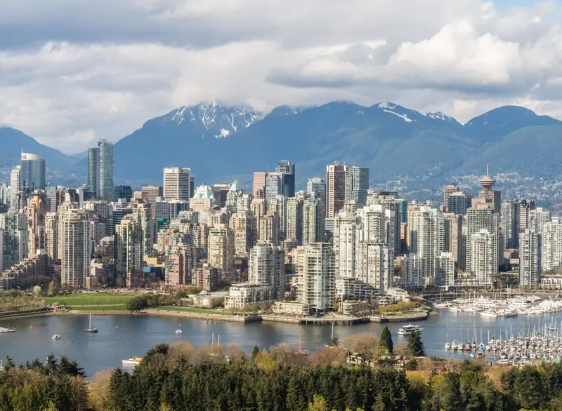 Downtown Vancouver skyline with the North Shore mountains behind it