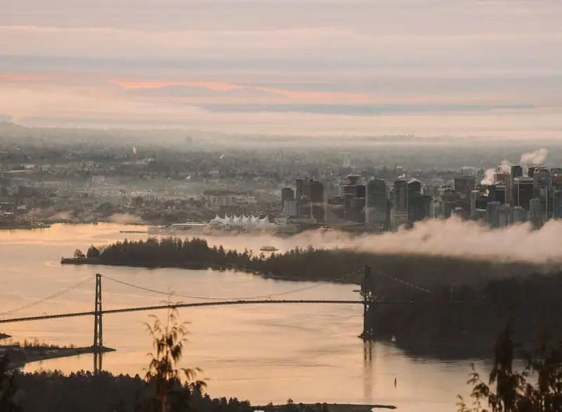 Lions Gate Bridge leading toward West Vancouver at dusk