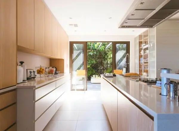 A bright kitchen after a Good Maid deep clean, with clean cabinets and counters